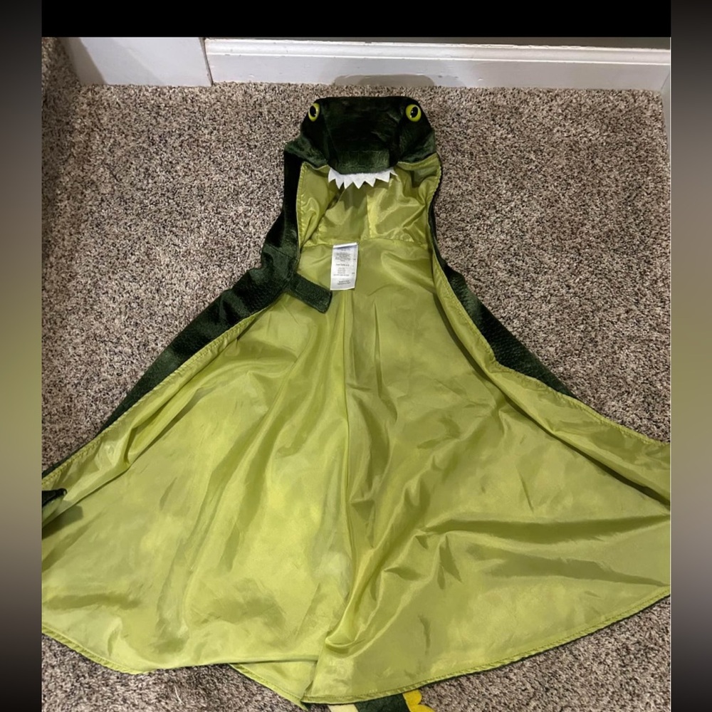 Great Pretender’s dress up dinosaur costume/cape.